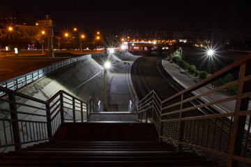Railway station at night. Footbridge