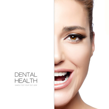 Dental Care. Beautiful woman half face with a healthy smile