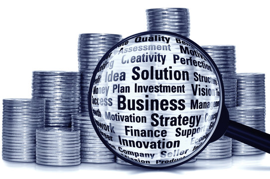 Coins and magnifier