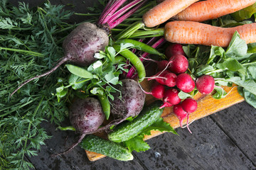 Fresh vegetables  on wooden background.