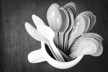 Mug and colorful spoons