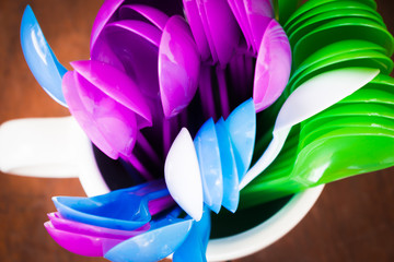 Mug and colorful spoons