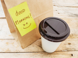 Cup of coffee and notepad