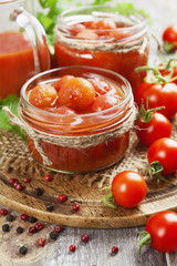 Fototapeta na wymiar Canned tomatoes in tomato juice