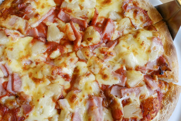 delicious hawaiian rustic style pizza made with fresh pineapples