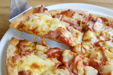 delicious hawaiian rustic style pizza made with fresh pineapples