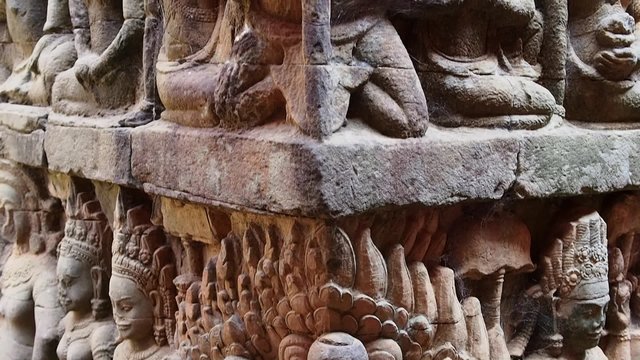 Carvings of mythological beings at the Leper King Terrace in Angkor Thom, Siem Reap, Cambodia.