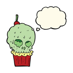 cartoon spooky skull cupcake with thought bubble