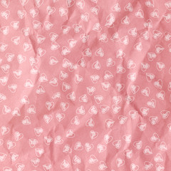 Hearts patten on paper texture background.