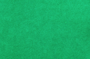 Green paper background.