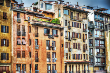 Fototapeta na wymiar colorful building facades in Florence