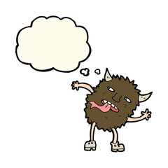 funny cartoon monster with thought bubble