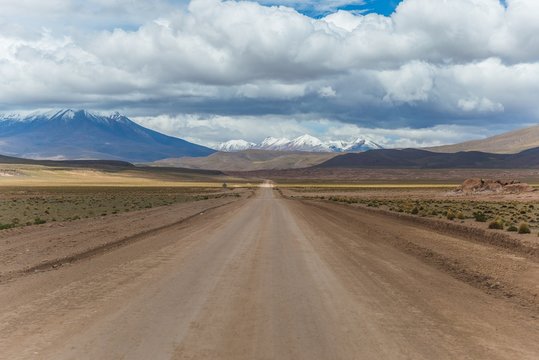 road in the middle of the bolivian altiplano