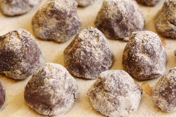 Fototapeta na wymiar row of delicious confectionery - chocolate truffle with copy space 