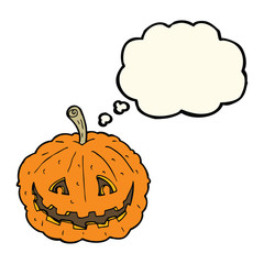 cartoon grinning pumpkin with thought bubble