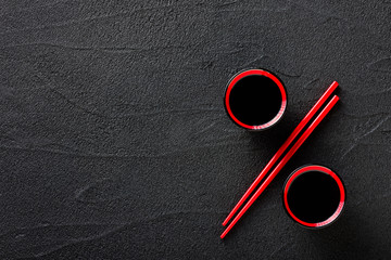 Chopsticks and bowl with soy sauce, discount concept