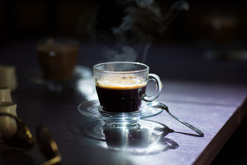 cup of hot coffee on the table