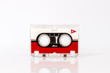 Old micro audio cassette isolated on white background