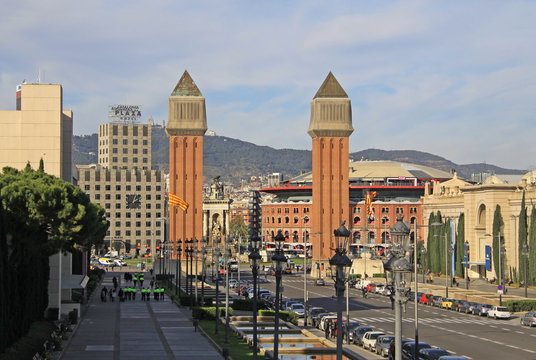 BARCELONA - DECEMBER 13, 2011: Avinguda de la Reina Maria Cristina - Street leading to Venetian Towers on Placa d'Espanya in Barcelona