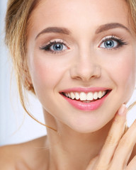 Portrait of beautiful woman on white background