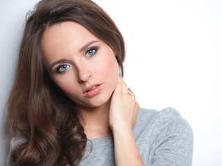 Portrait of an attractive fashionable young brunette woman