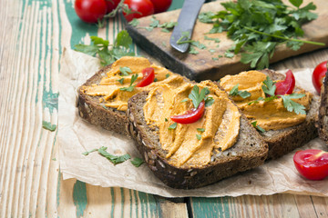 sandwich with tomato pate and chopped parsley - delicious breakfast