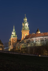 Naklejka na ściany i meble Wawel Castle and Wawel cathedral seen from the Vistula boulevards in the evening