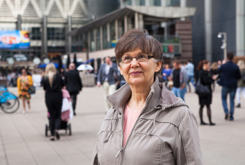 Pension age good looking woman portrait in the City. London