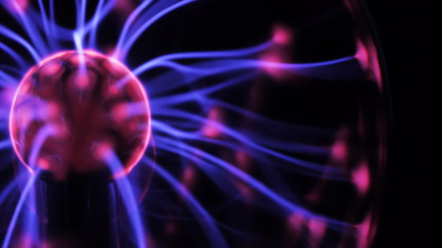 4K Plasma ball with moving energy rays inside on black background. Seamlessly looping timelapse. 4K UHD 4096 x 2304 ultra high definition