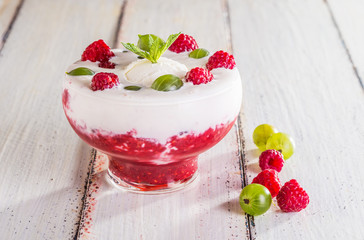 Ice cream with raspberry mousse and berries