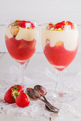 Strawberry tiramisu decorated with pieces of strawberries and pi
