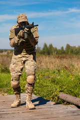 Fototapeta premium Soldier with a rifle
