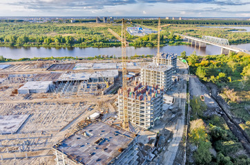 View on construction site in Tyumen and Tura river
