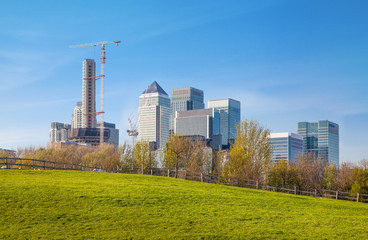 LONDON, UK - APRIL 14, 2015: London, Canary Wharf fire from the local farm fields. 