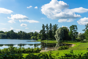 beautiful  ornamental park with pond at Catherine's Summer Palace with pond reflecting the trees in summer