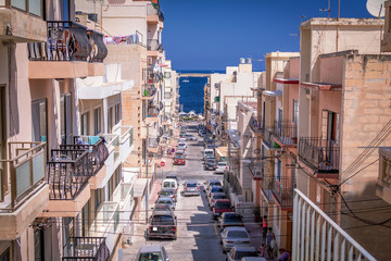 Street leading to sea, Bugibba, Malta