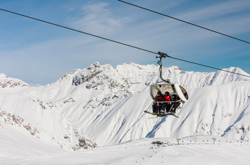 Fototapeta na wymiar LIVIGNO, ITALY - JANUARY 28, 2015: Ski lift. Alps. Livigno, Lombardi, January 28, 2015, Italy. Livigno is developing ski resort in northern Italy