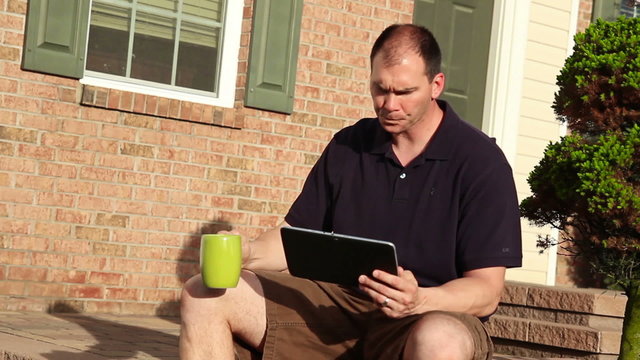 Man Uses Tablet PC