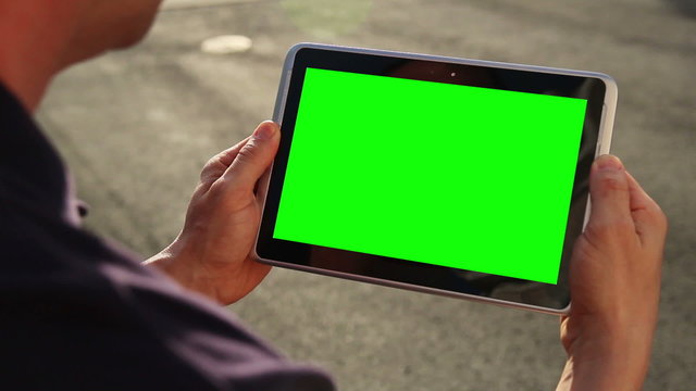 Blank Green Screen Tablet PC Outside
