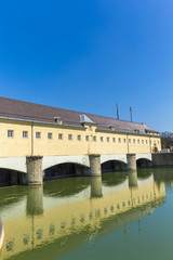 Fototapeta na wymiar Historic weir at the river Isar in Munich