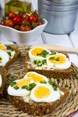 Healthy whole wheat sandwiches with eggs and chives