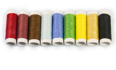 Sewing thread on a white background