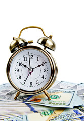 alarm clock over money