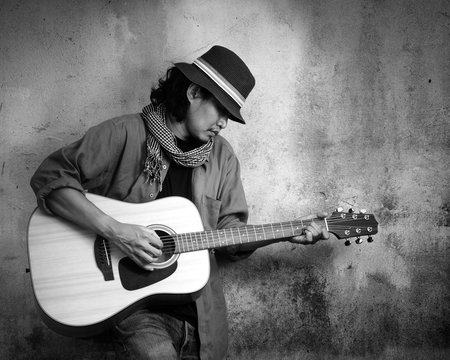 Man playing guitar. Black and white photo