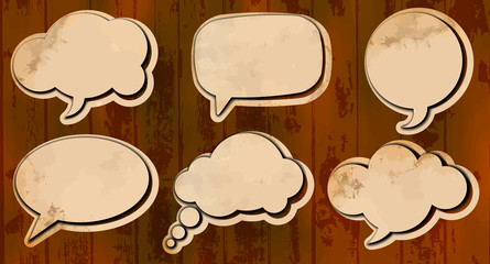 Aged cut out speech bubbles