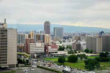 Fototapeta na wymiar Aerial view cityscape of Osaka city at around Osaka castle