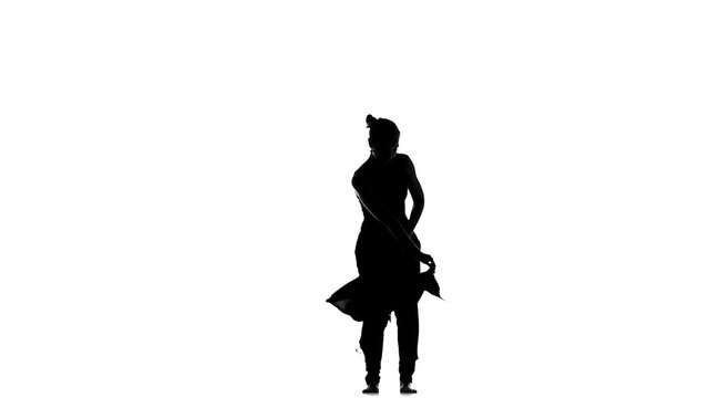 Beautiful latina dancer in action, on white, silhouette, slow