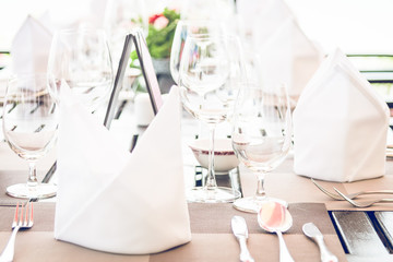 Table dining set in the hotel restaurant - light vintage filter