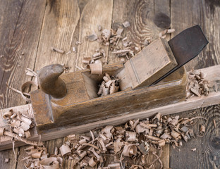 Old wooden plane in a workshop