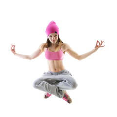 Jumping teen girl hip-hop dancer over white background